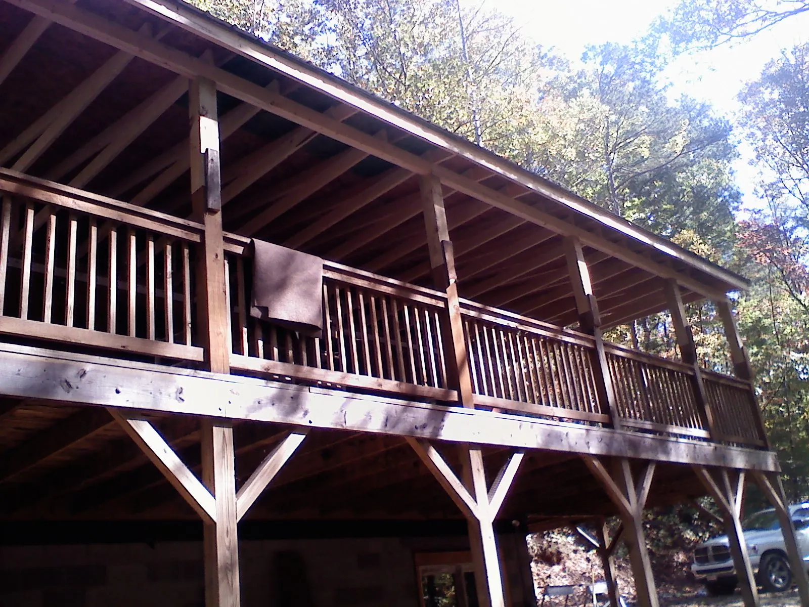 Timber framing under a new elevated porch and deck — Roof Leak Repair in Canastota by Roofing Brothers